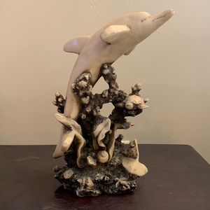 Dolphin and sea life figurine